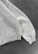 AKIMBO ZIP UP HOODIE – HEATHER GREY (1)